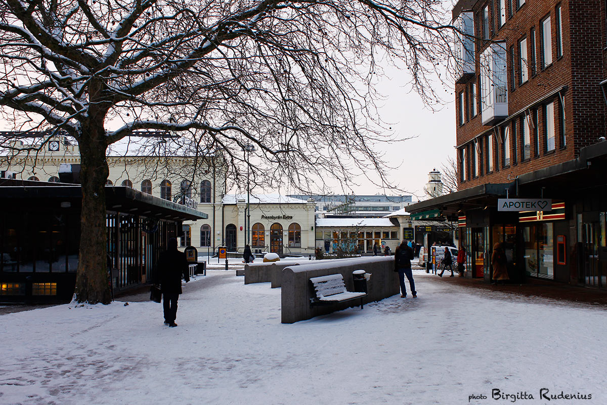 Opposite train station